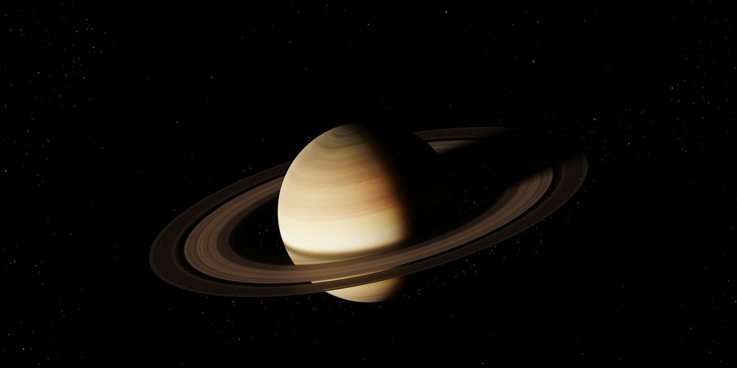 Saturn and its rings in the dark expanse of space