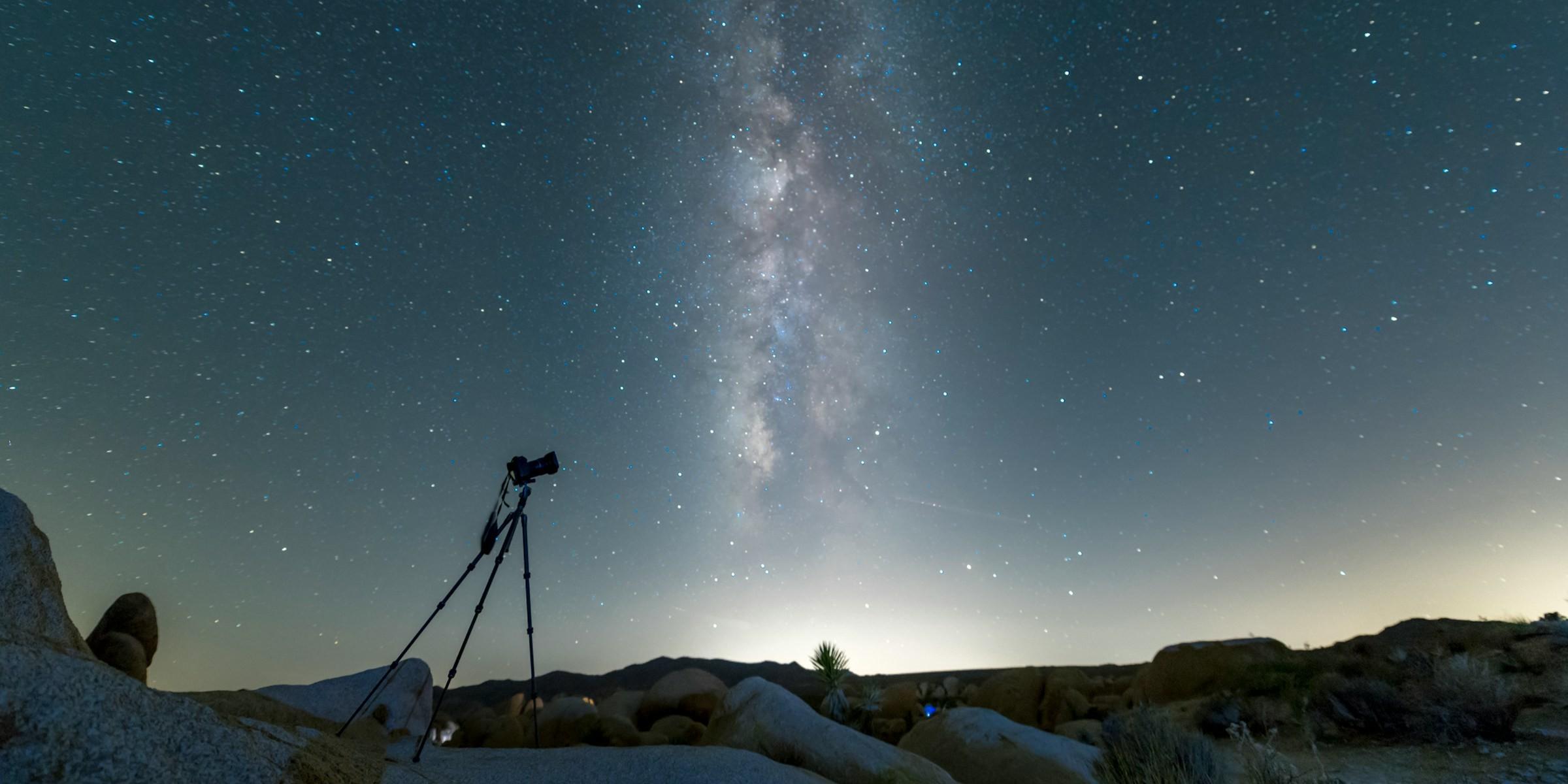 Camera taking photo of night sky